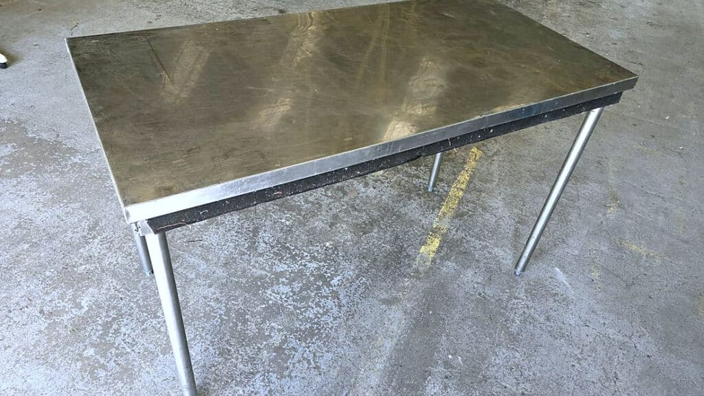Table Inox Emboîtable 140×70 en location chez Flyin'Chef