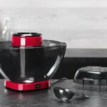 Machine à pop-corn démontée en trois parties avec sa cuillère doseuse